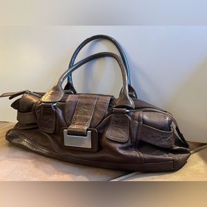Kenneth Cole, Reaction handbag; chocolate brown leather.